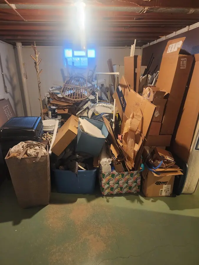 Roll-off dumpster container at job site for Cleanout Dumpster Rental in Bangor